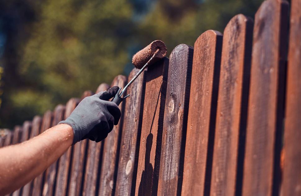 dark brown Sherwin Williams paint decking fence painting services Indianapolis IN