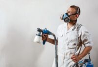 painter-with-painting-gear-working-for-oscar-roofing painter with painting gear working Indianapolis